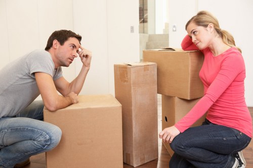Moving team carrying furniture during a relocation